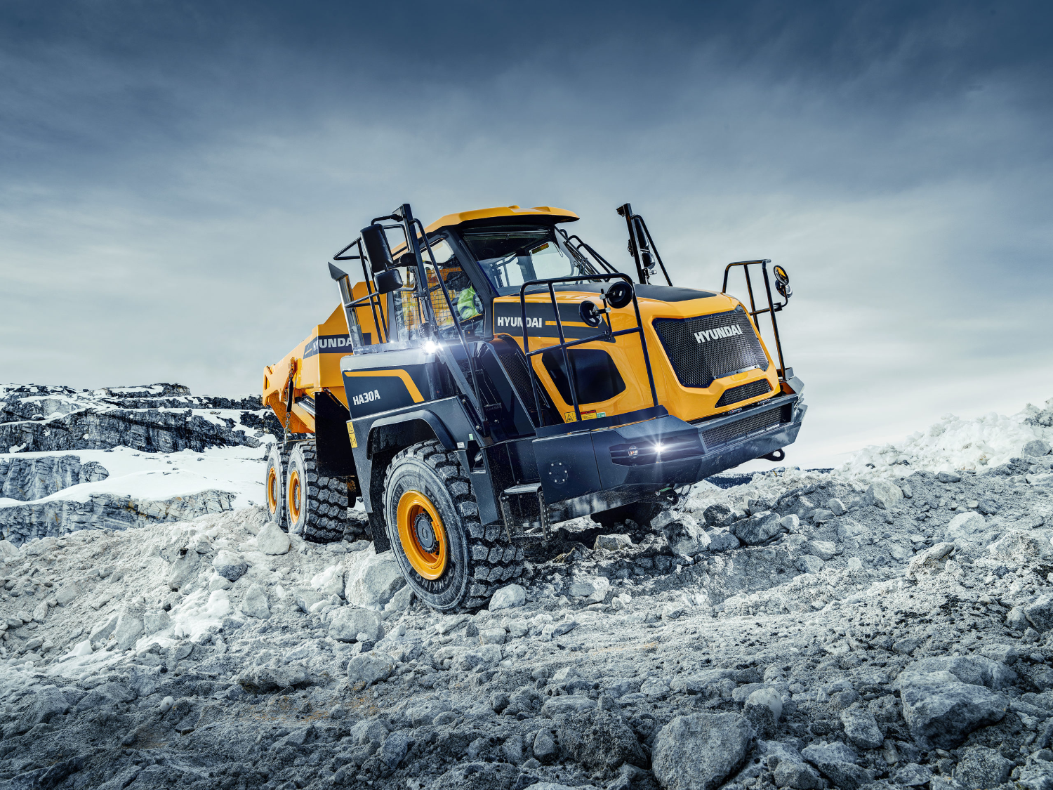 Heavy articulated hauler working in a quarry