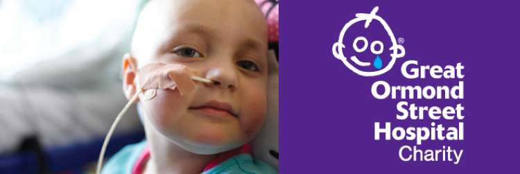 A young patient at Great Ormond Street Hospital, beside the Great Ormond Street Hospital Charity logo