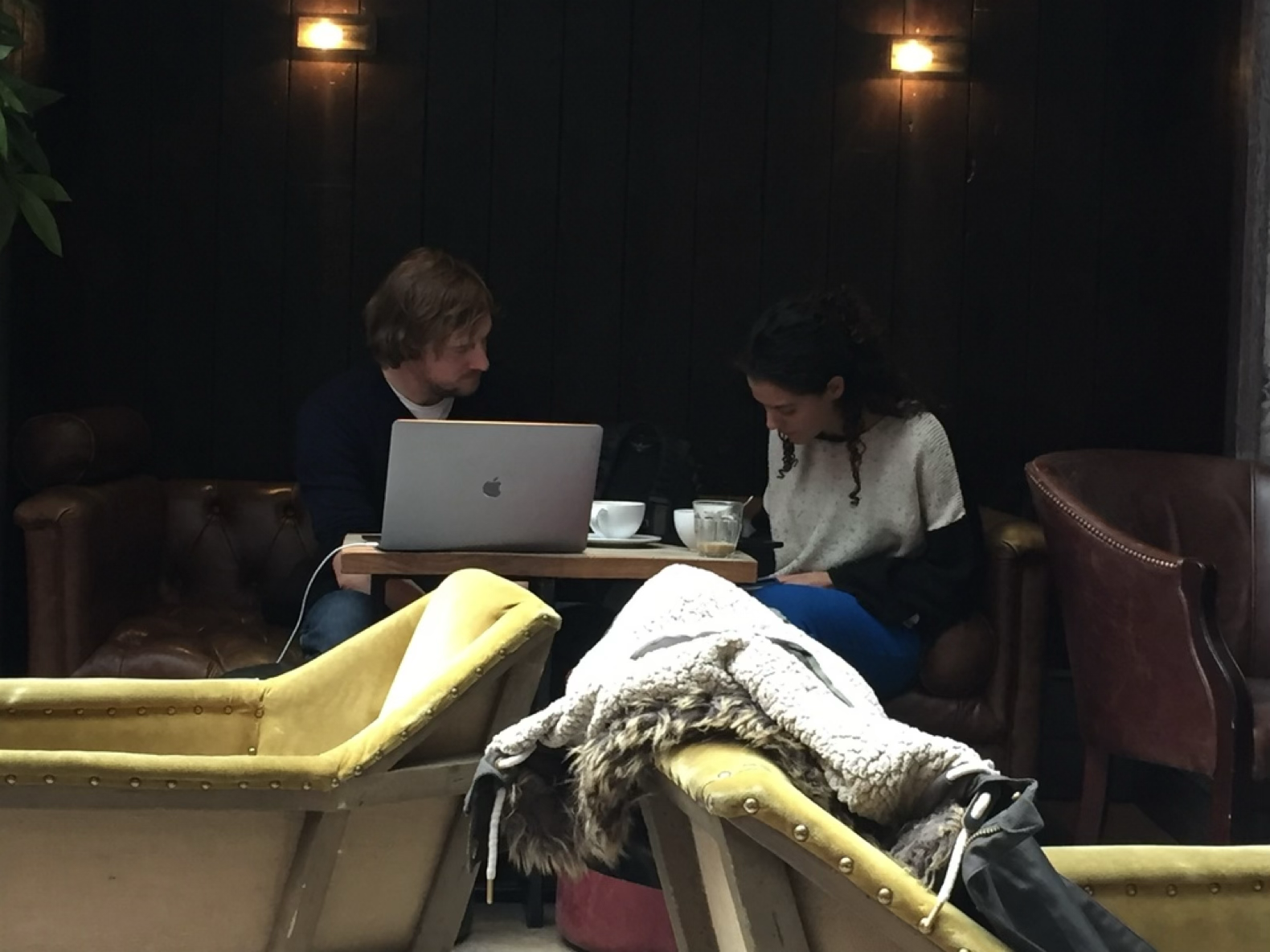 Testing a prototype with a small business owner, coffee shop guerrilla-testing session